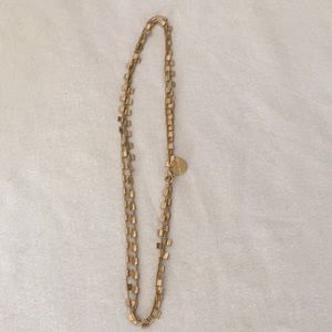 NWOT gold tone necklace. Worn single or doubled.